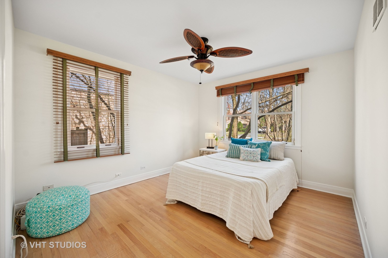 630 Juniper Road Glenview, IL 60025 - Photo 26 of 52 a bedroom with a bed dresser and a window