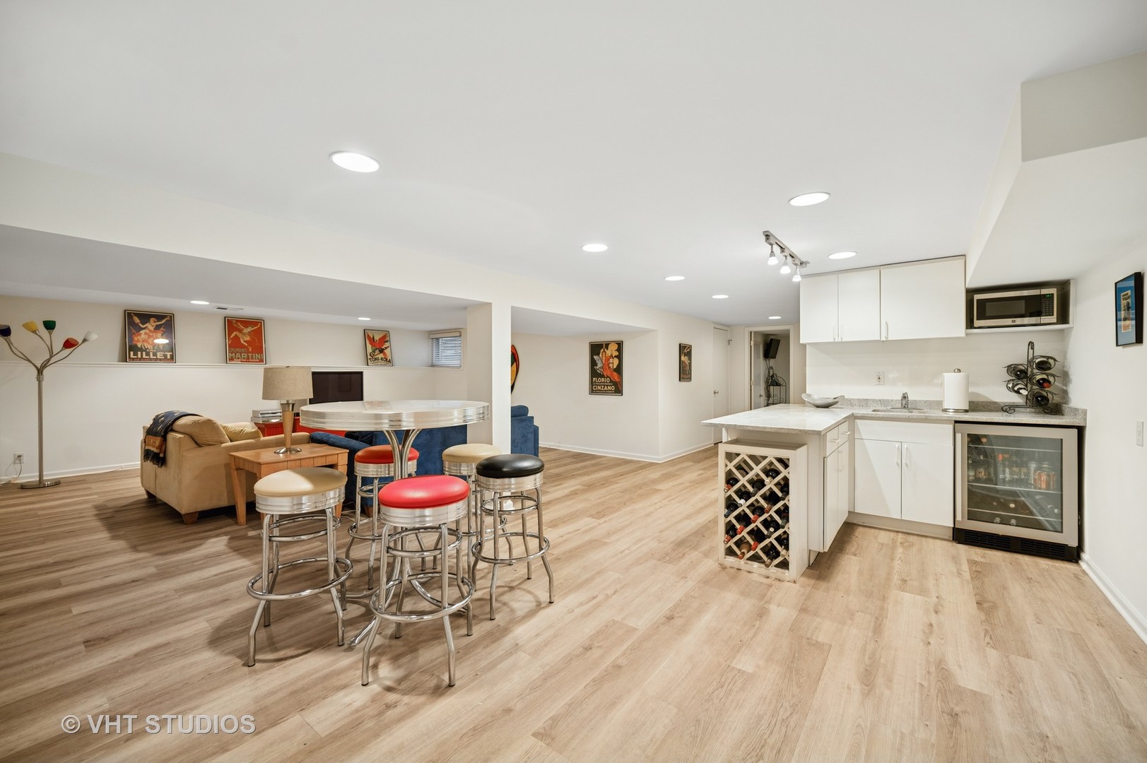 630 Juniper Road Glenview, IL 60025 - Photo 31 of 52 a kitchen with a sink and chairs