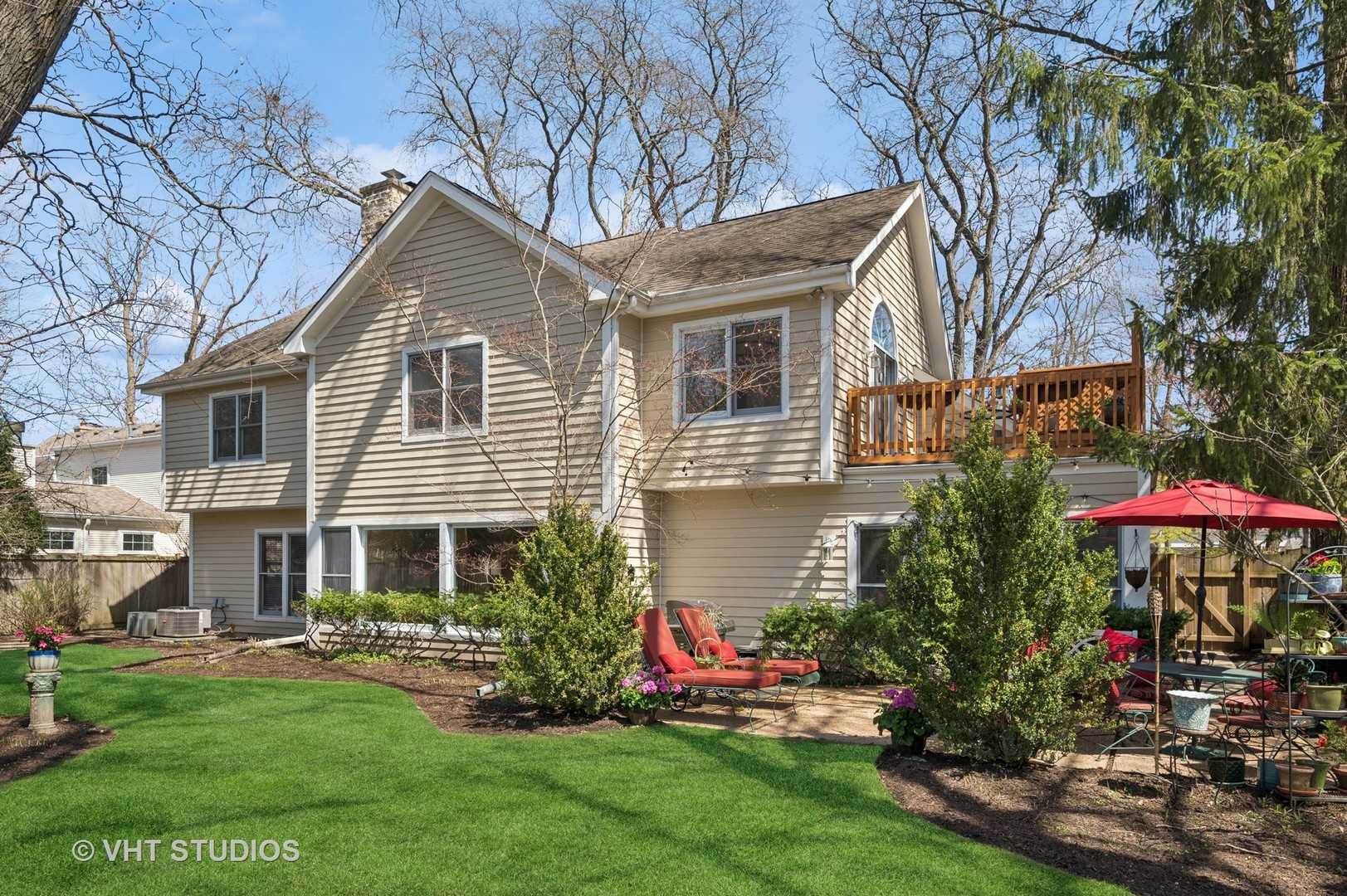 630 Juniper Road Glenview, IL 60025 - Photo 34 of 52 a front view of a house with a yard and trees