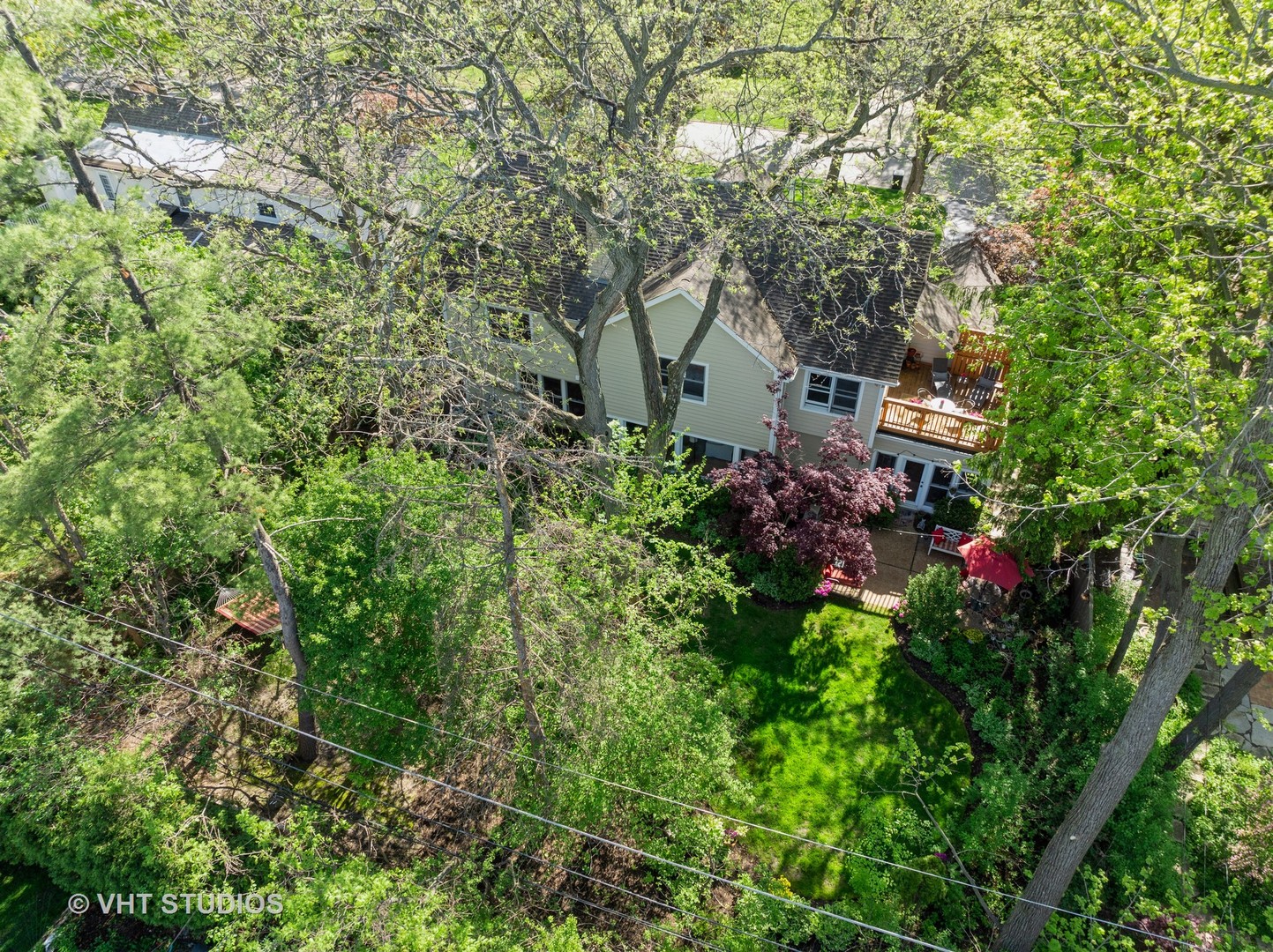 630 Juniper Road Glenview, IL 60025 - Photo 47 of 52 a view of a house with a tree