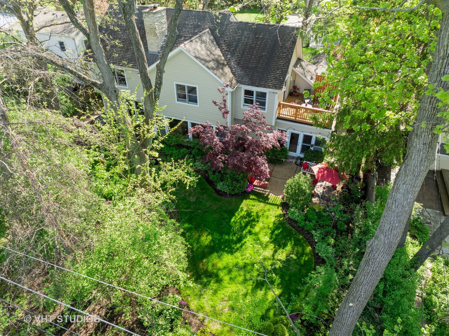 630 Juniper Road Glenview, IL 60025 - Photo 48 of 52 a front view of house with a garden