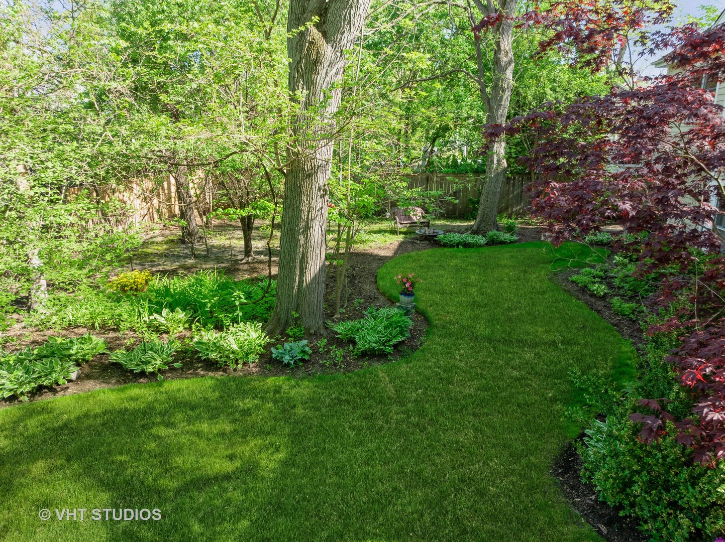 630 Juniper Road Glenview, IL 60025 - Photo 50 of 52 a green field with lots of bushes