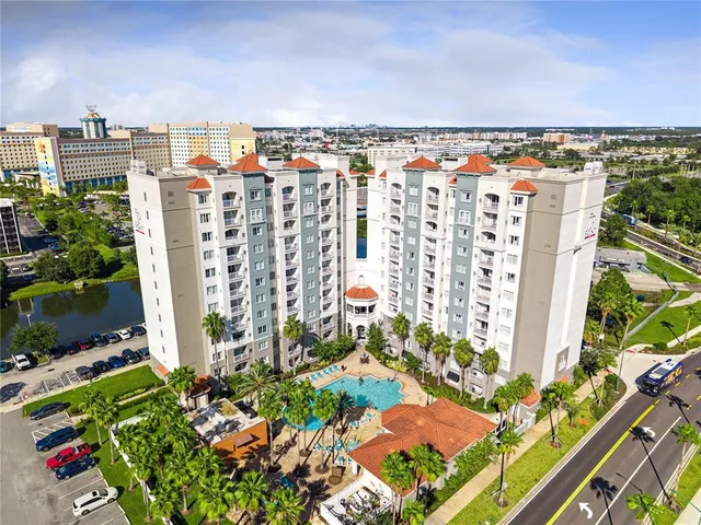 a view of a building with a yard