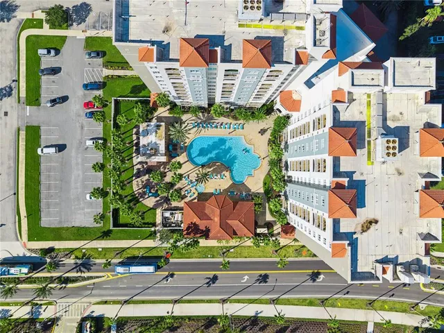 a picture of a bench in front of a white house
