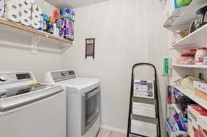 a utility room with dryer and washer