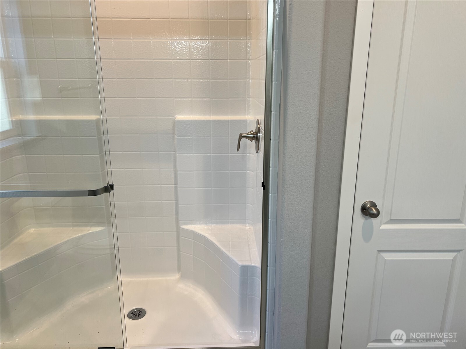 3371 Southeast Bielmeier Road, Unit 79 Port Orchard, WA 98367 - Photo 11 of 16 a bathroom with a shower