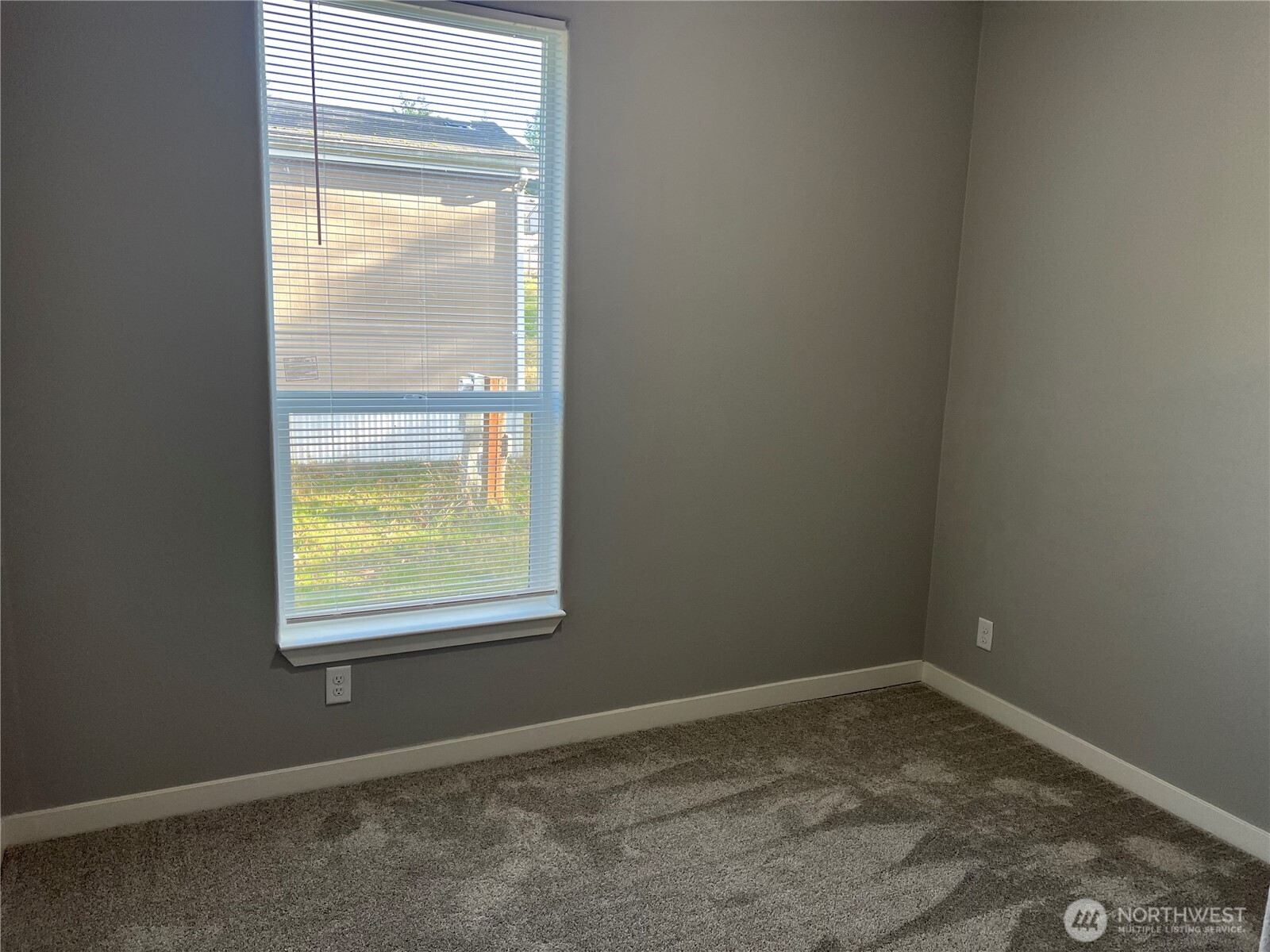 3371 Southeast Bielmeier Road, Unit 79 Port Orchard, WA 98367 - Photo 12 of 16 an empty room with a window