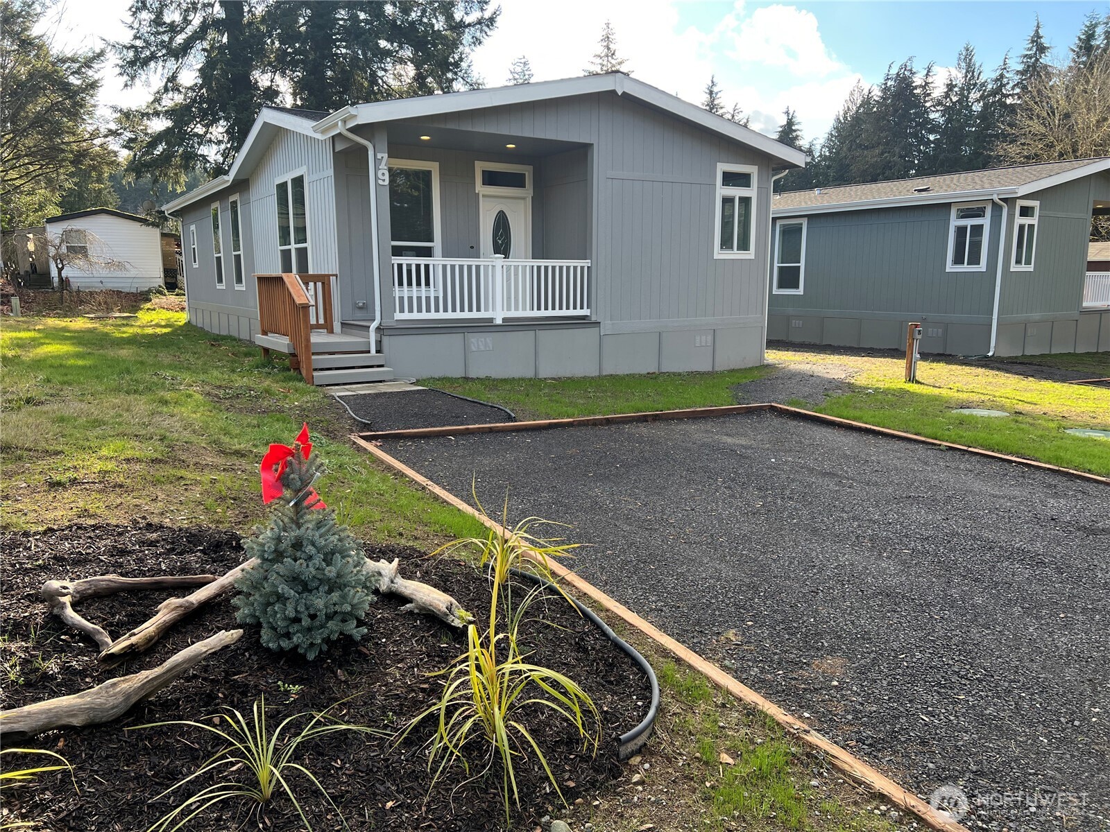 3371 Southeast Bielmeier Road, Unit 79 Port Orchard, WA 98367 - Photo 16 of 16 a house view with a backyard space