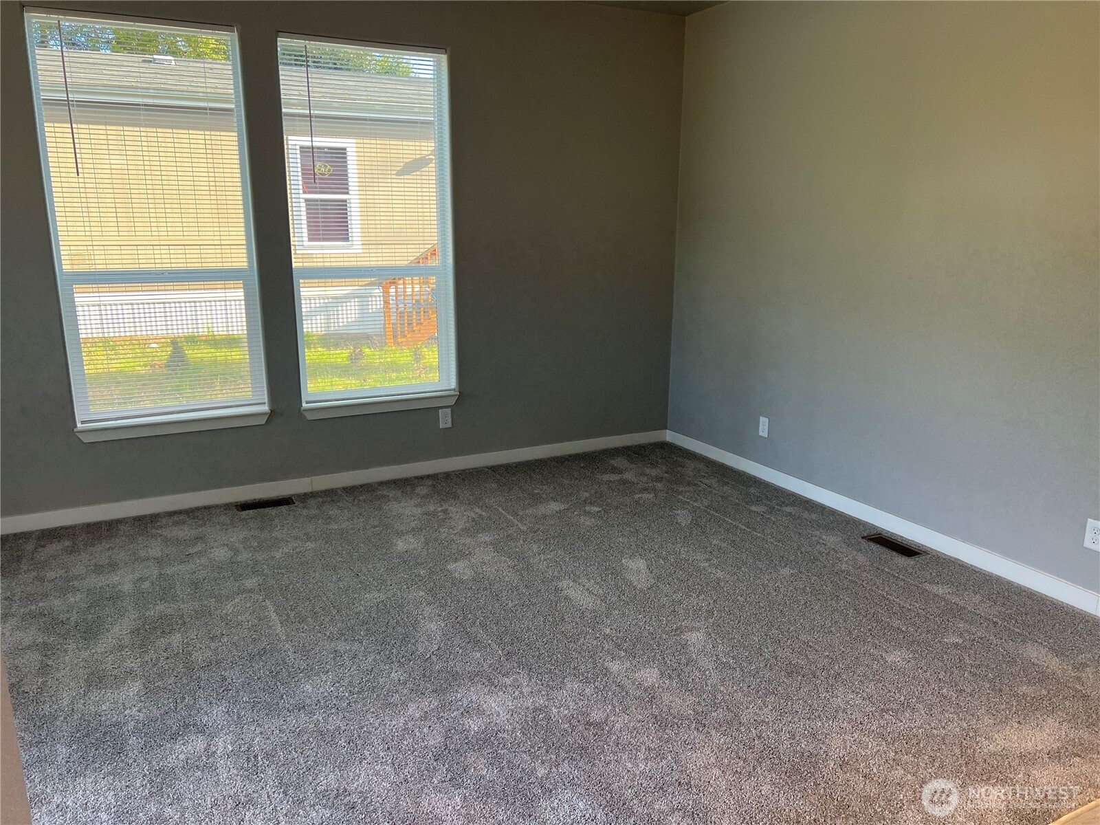3371 Southeast Bielmeier Road, Unit 79 Port Orchard, WA 98367 - Photo 5 of 16 an empty room with a window