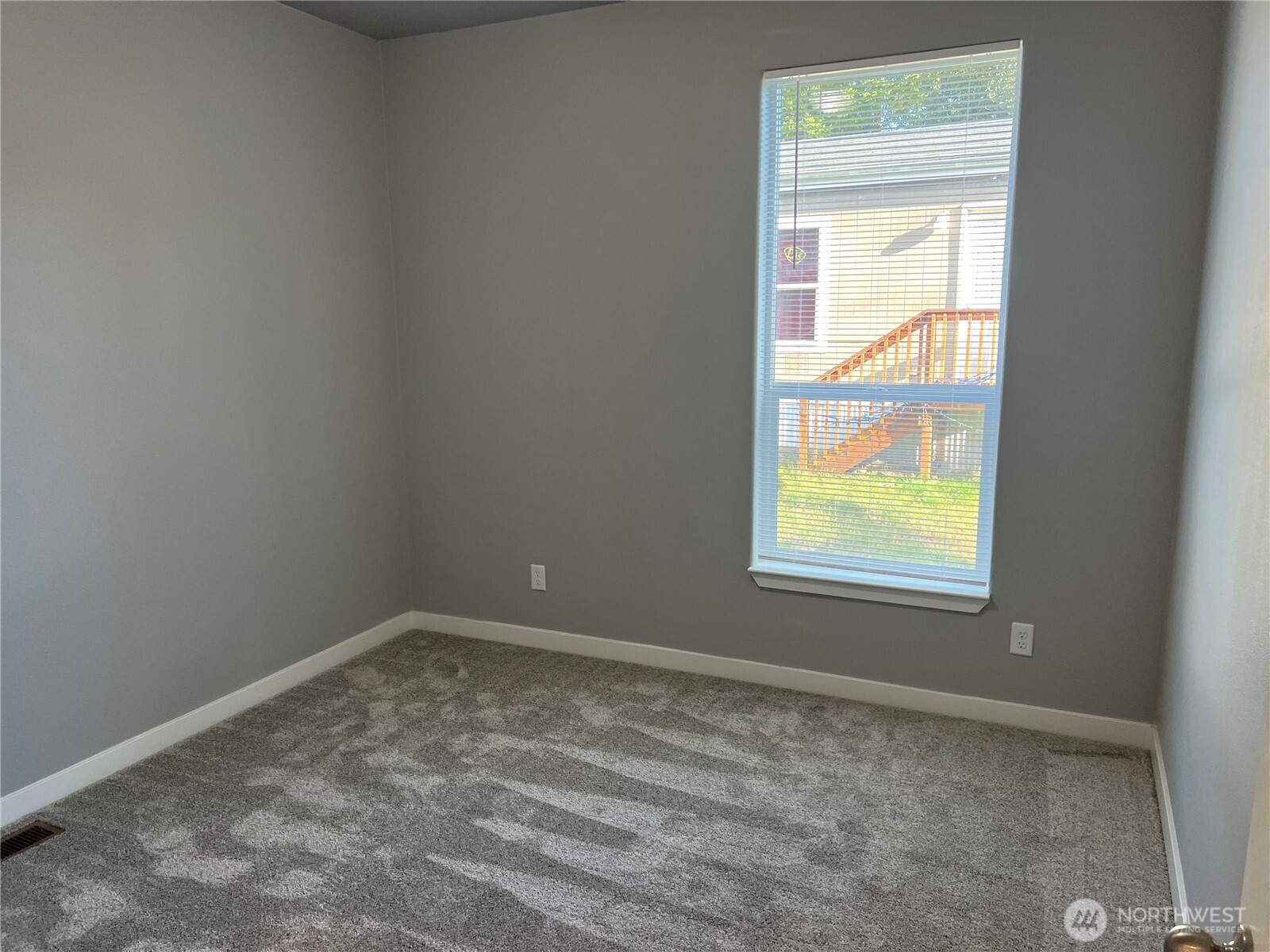 3371 Southeast Bielmeier Road, Unit 79 Port Orchard, WA 98367 - Photo 7 of 16 an empty room with a window