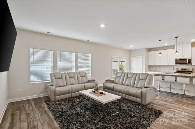 a living room with furniture and a couch