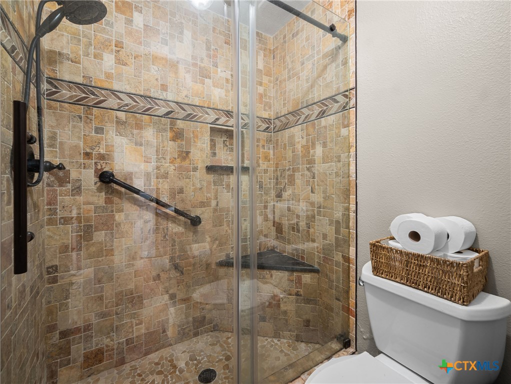 782 Santa Clara Loop Marion, TX 78124 - Photo 45 of 48 a bathroom with a toilet and a shower