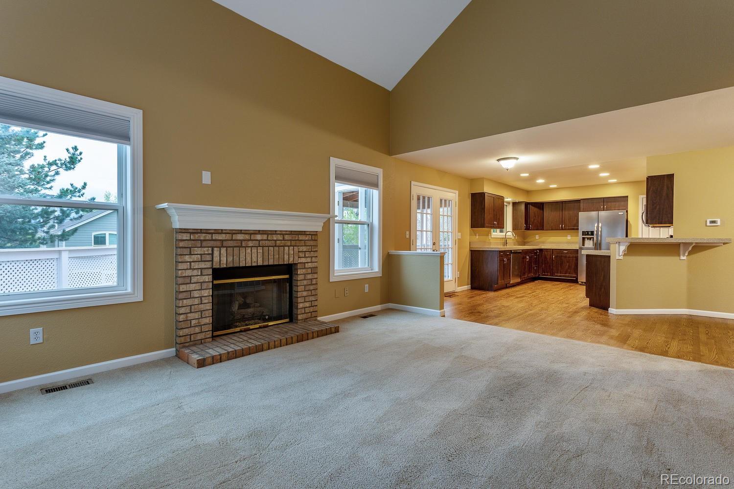 9869 Spring Hill Drive Highlands Ranch, CO 80129 - Photo 11 of 37 a view of a livingroom with a fireplace