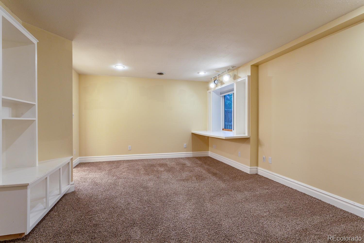 9869 Spring Hill Drive Highlands Ranch, CO 80129 - Photo 23 of 37 a view of an empty room and window