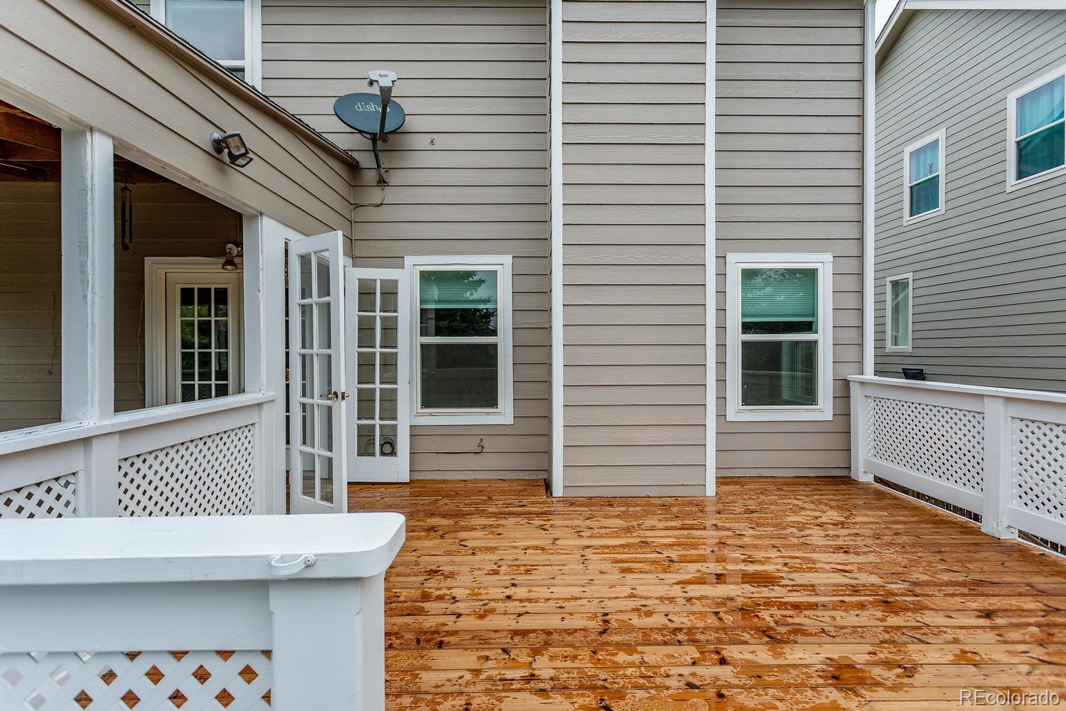 9869 Spring Hill Drive Highlands Ranch, CO 80129 - Photo 32 of 37 a view of house with outdoor space