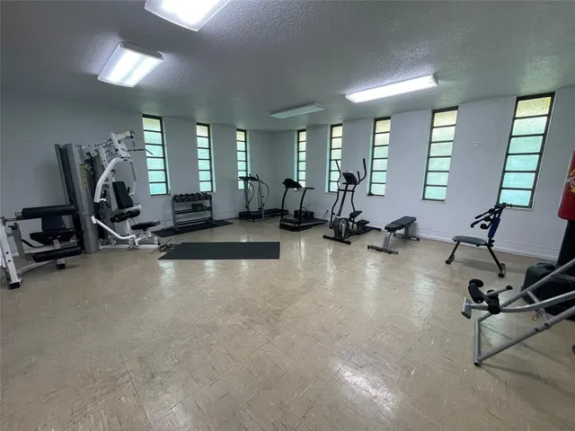 a view of a room with gym equipment