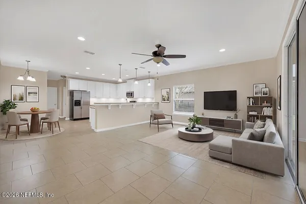 a living room with furniture and a window