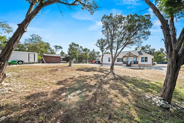a view of back yard of the house