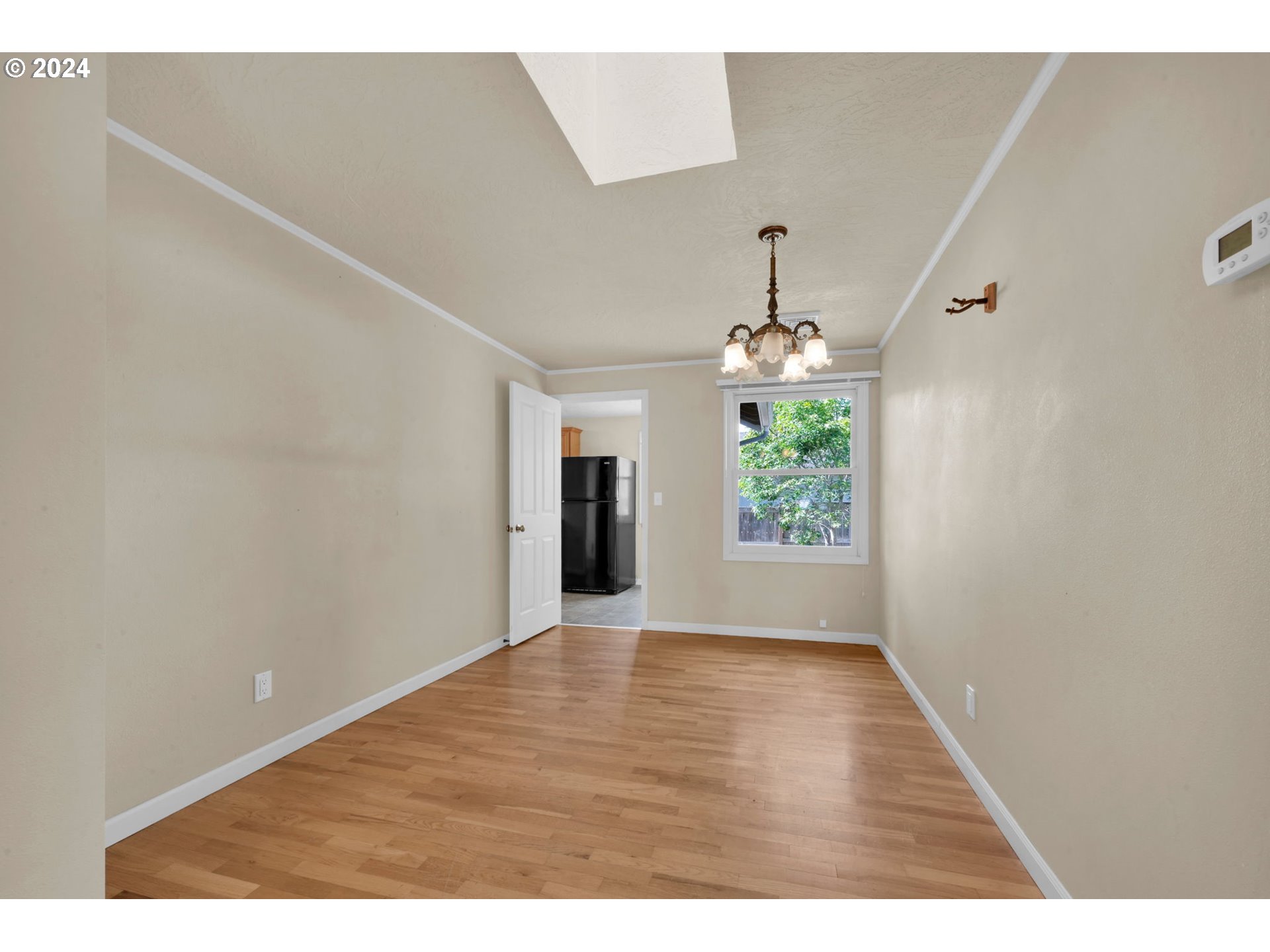 750 66th Street Springfield, OR 97478 - Photo 12 of 41 a view of an empty room with a window