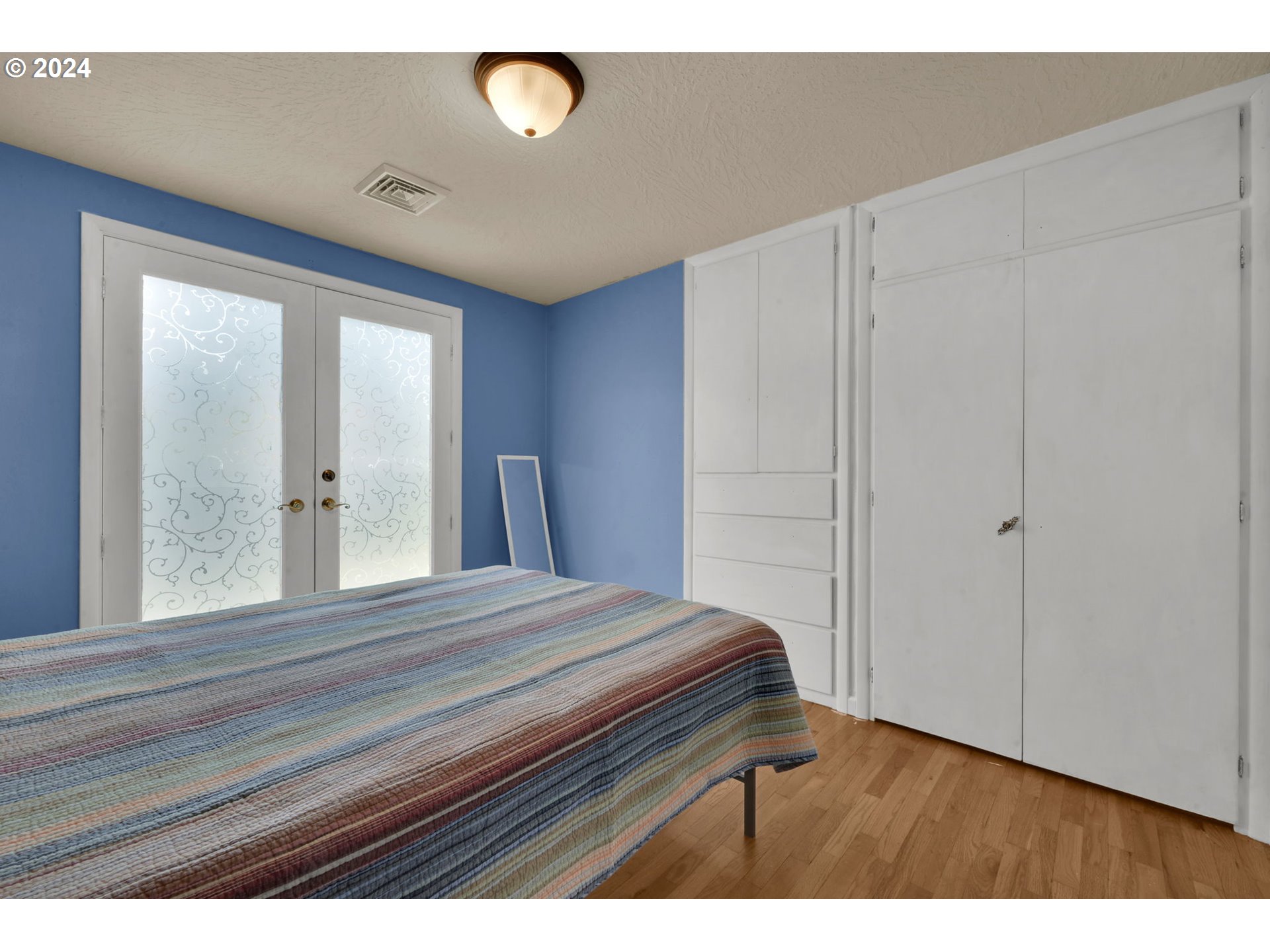 750 66th Street Springfield, OR 97478 - Photo 26 of 41 a view of bedroom with wooden floor