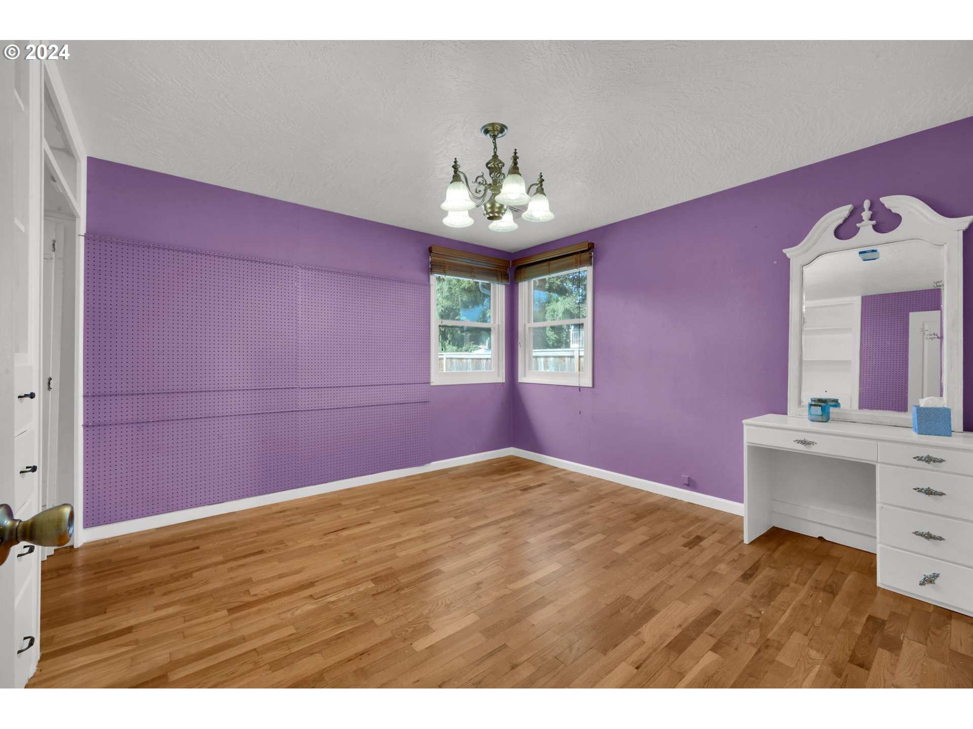 750 66th Street Springfield, OR 97478 - Photo 27 of 41 a bedroom with a bed and a dresser