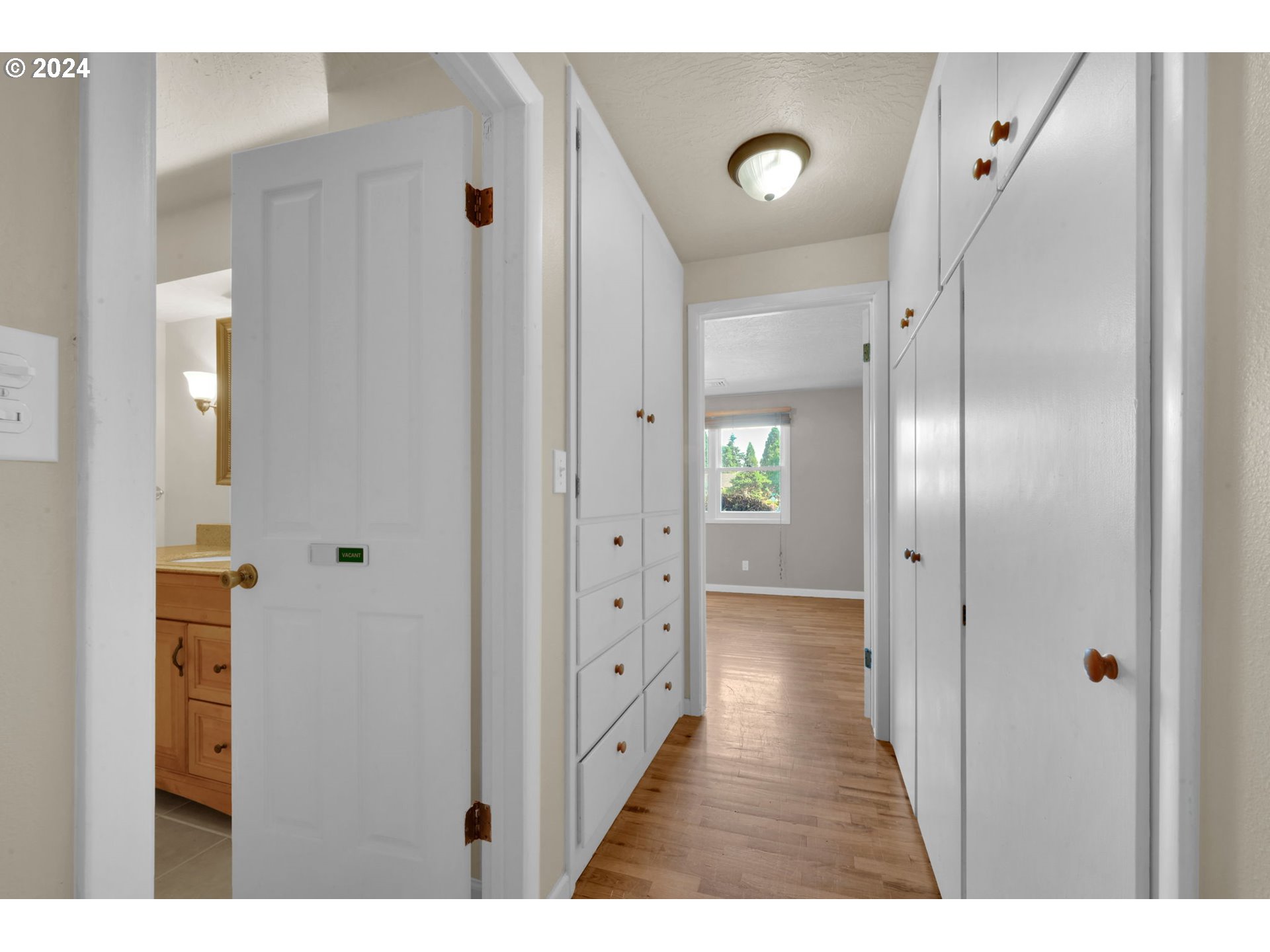 750 66th Street Springfield, OR 97478 - Photo 29 of 41 a view of a hallway with wooden floor