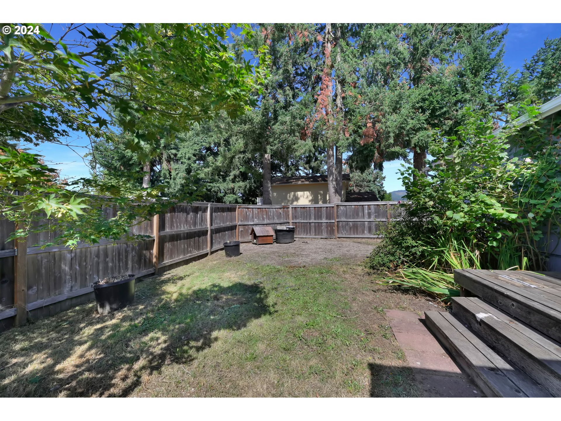 750 66th Street Springfield, OR 97478 - Photo 36 of 41 a view of a backyard with sitting area