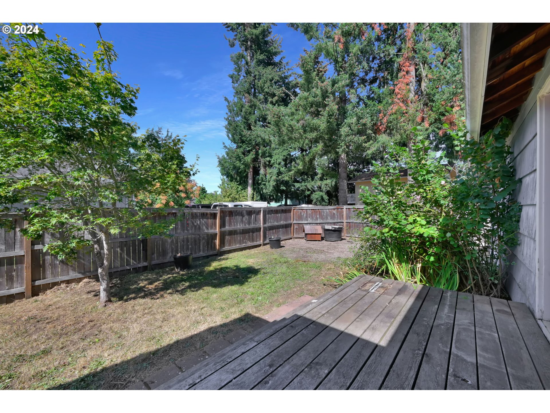 750 66th Street Springfield, OR 97478 - Photo 40 of 41 a view of backyard with wooden floor