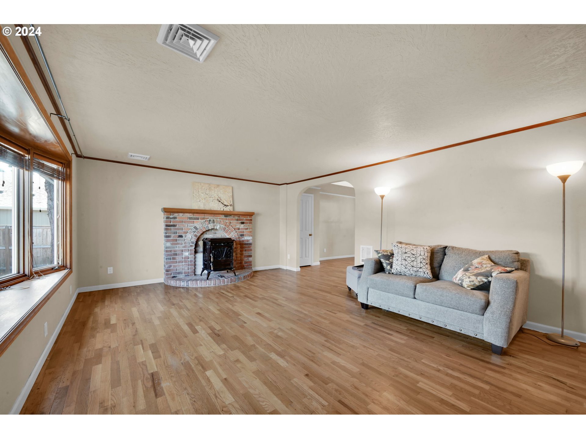 750 66th Street Springfield, OR 97478 - Photo 8 of 41 a living room with furniture and a fireplace