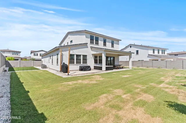 a view of a house with a swimming pool