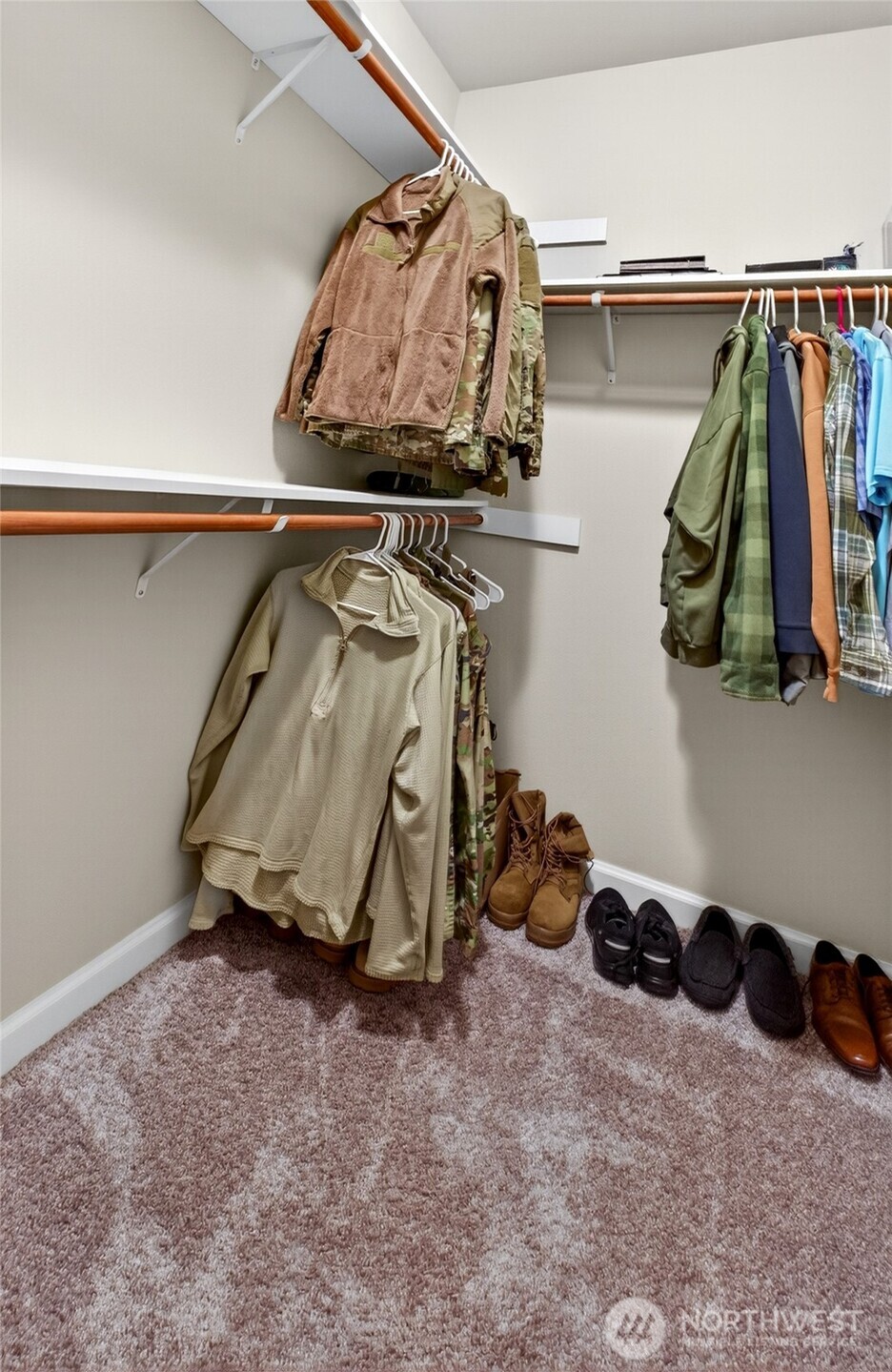 646 Mandee Street Southeast Lacey, WA 98513 - Photo 27 of 39 a view of walk in closet with clothes and shoes