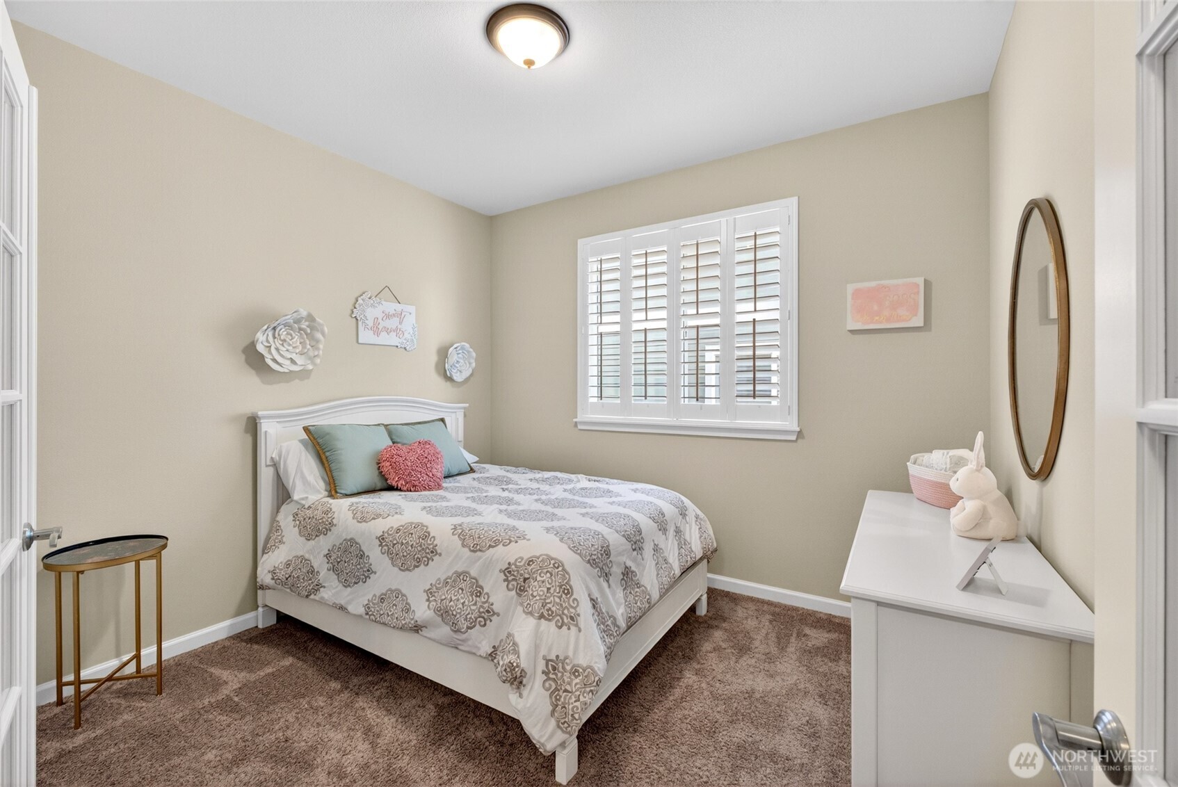 646 Mandee Street Southeast Lacey, WA 98513 - Photo 7 of 39 a bedroom with a bed and a window