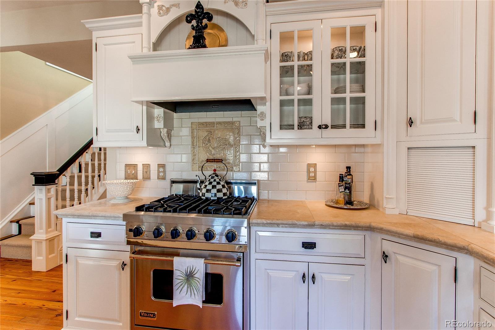 1135 Founders Circle Windsor, CO 80550 - Photo 12 of 45 a kitchen with a cabinets and a stove