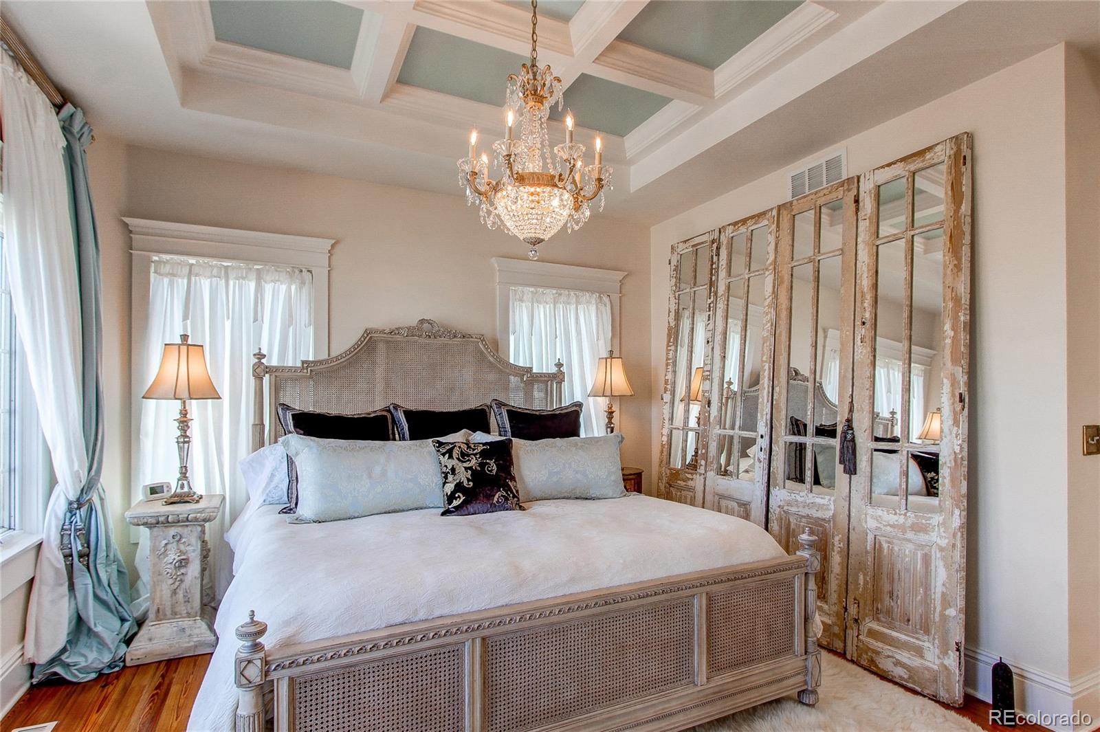 1135 Founders Circle Windsor, CO 80550 - Photo 18 of 45 a bedroom with a bed and a window