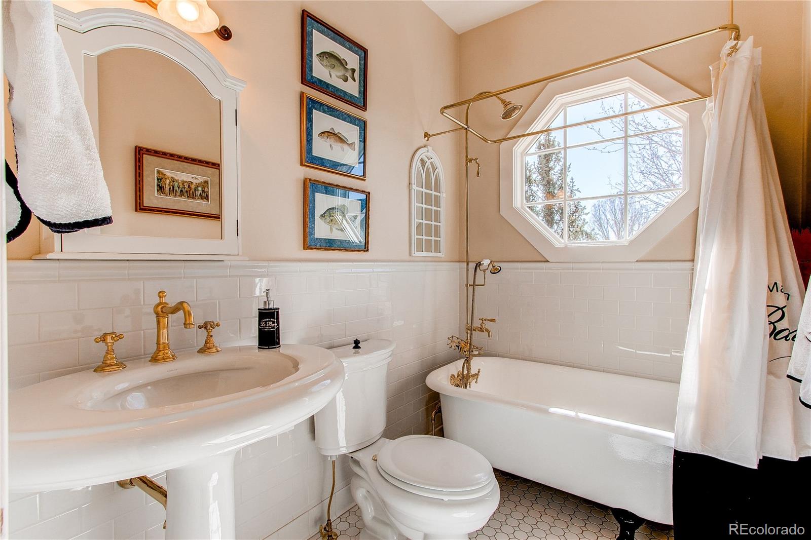 1135 Founders Circle Windsor, CO 80550 - Photo 27 of 45 a bathroom with a sink toilet and a bathtub