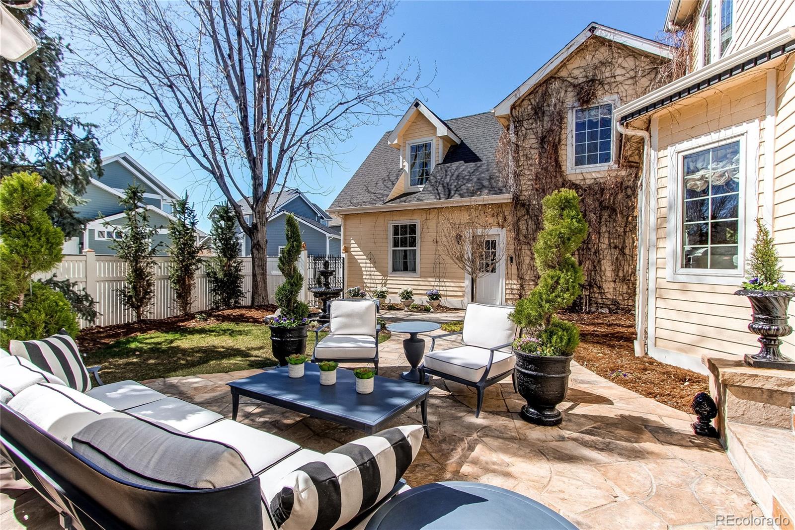 1135 Founders Circle Windsor, CO 80550 - Photo 39 of 45 a view of a house with backyard porch and sitting area