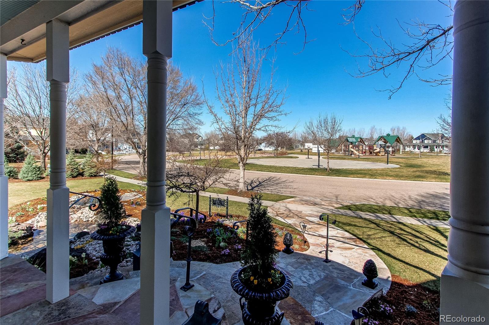 1135 Founders Circle Windsor, CO 80550 - Photo 43 of 45 a view of a balcony with lake view and a ocean view