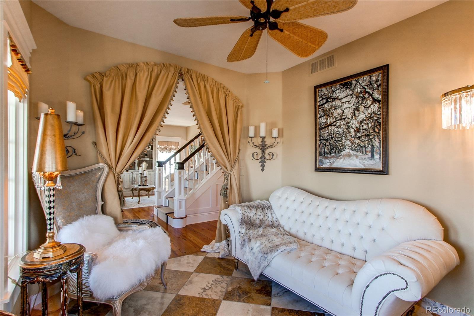 1135 Founders Circle Windsor, CO 80550 - Photo 9 of 45 a living room with furniture and a large window