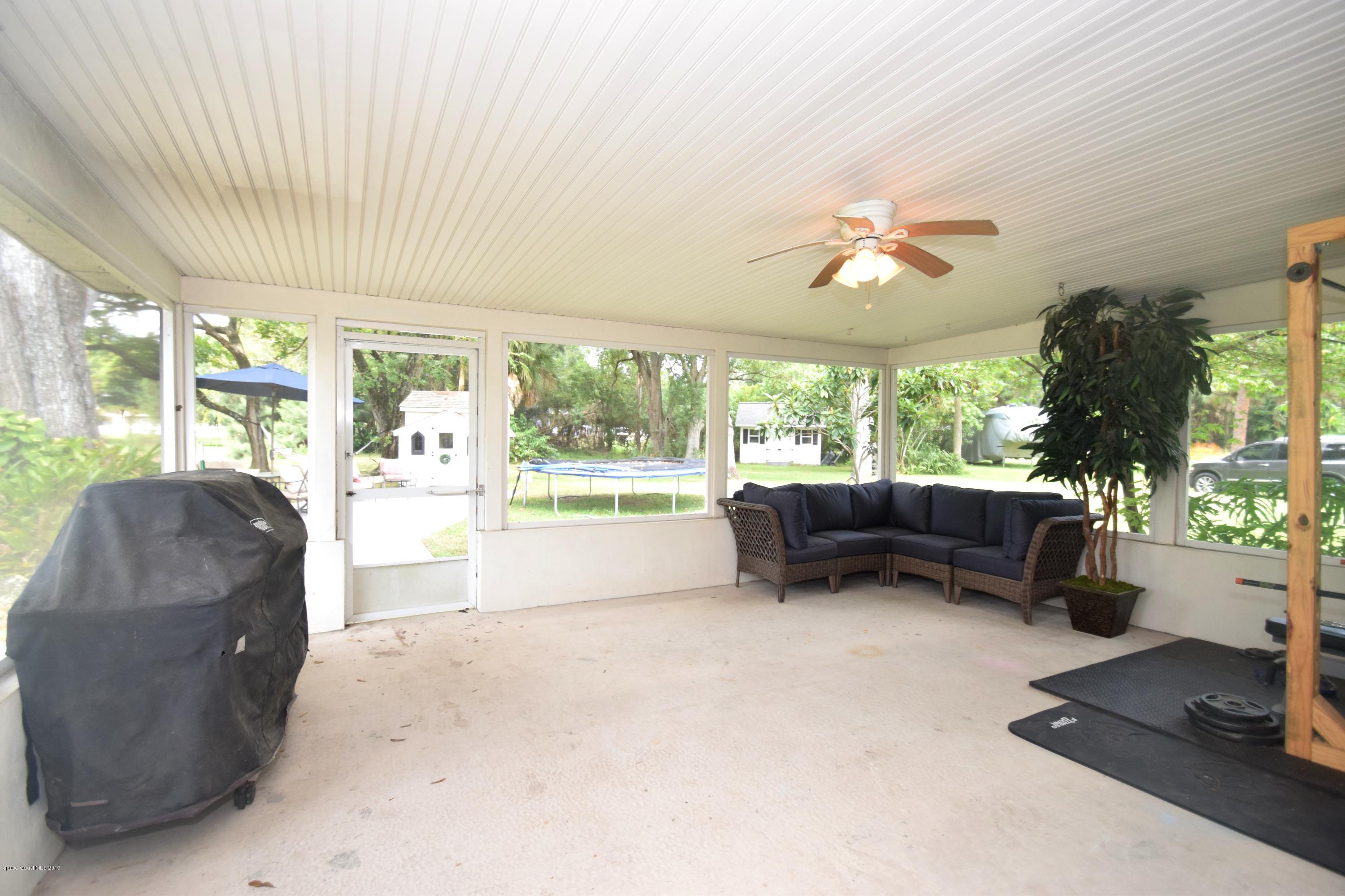 3940 Lake Washington Road Melbourne, FL 32934 - Photo 11 of 32 Screened Patio Main House