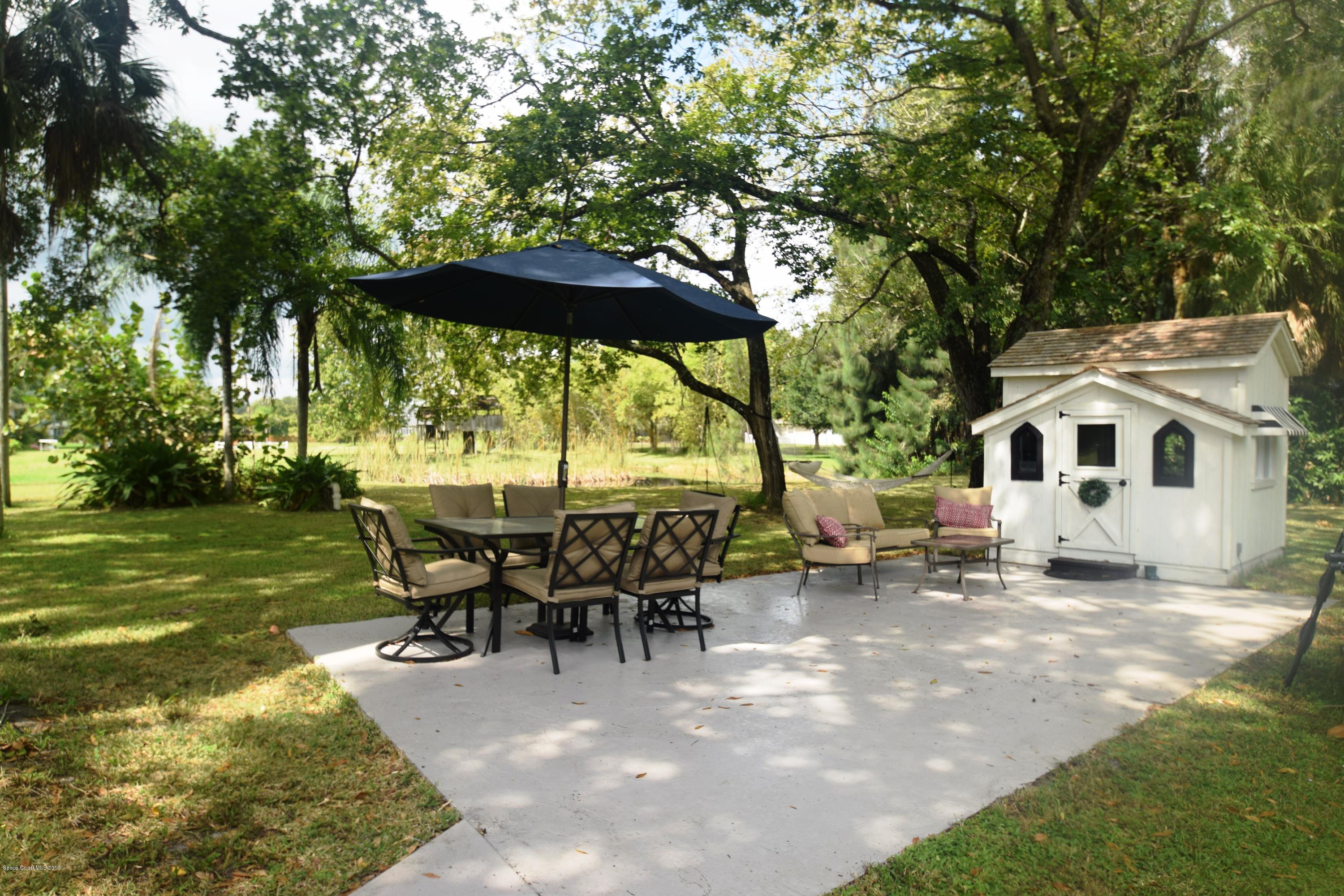3940 Lake Washington Road Melbourne, FL 32934 - Photo 12 of 32 Backyard Patio