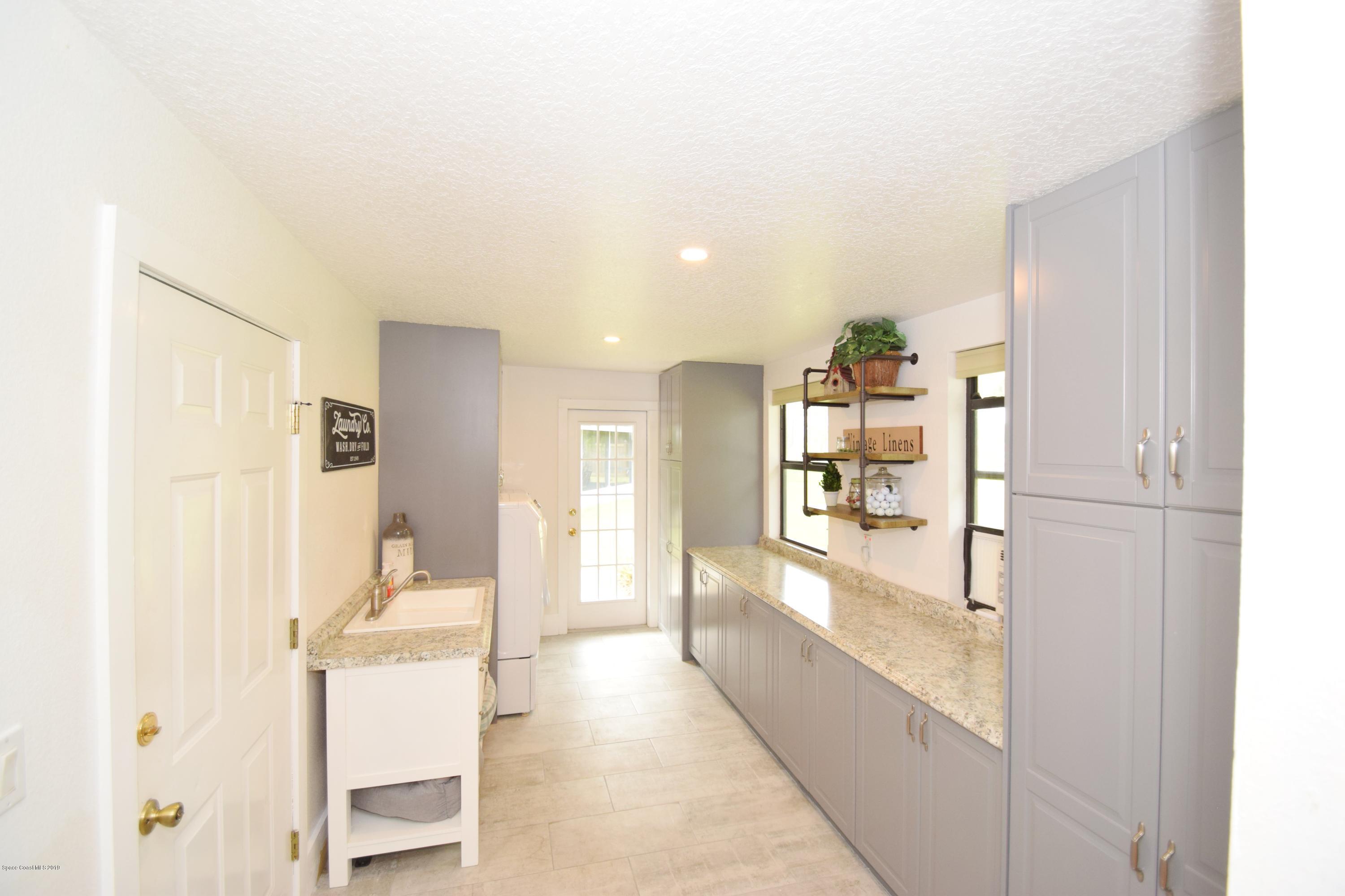 3940 Lake Washington Road Melbourne, FL 32934 - Photo 25 of 32 Laundry Rm