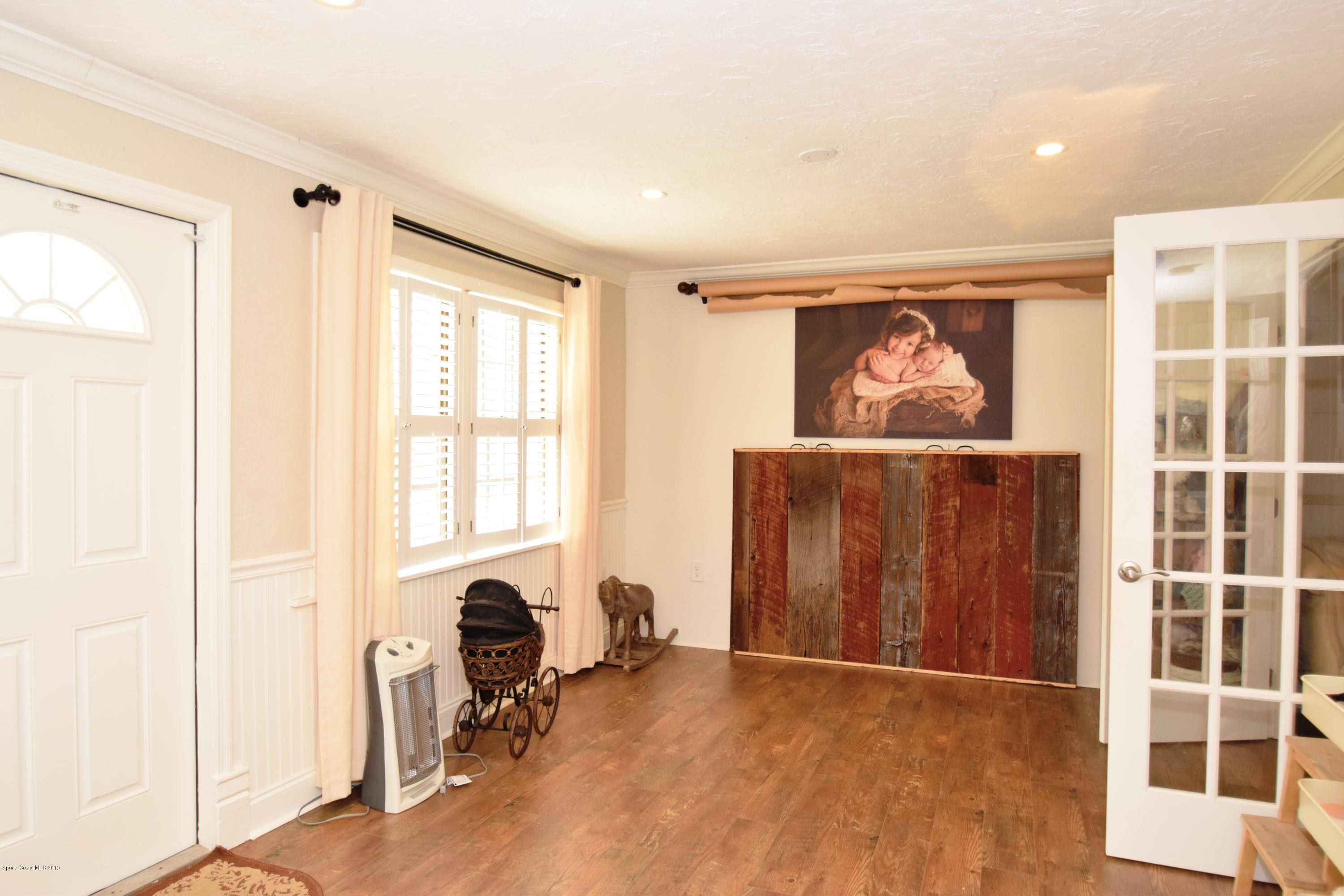 3940 Lake Washington Road Melbourne, FL 32934 - Photo 27 of 32 Living Area Cottage