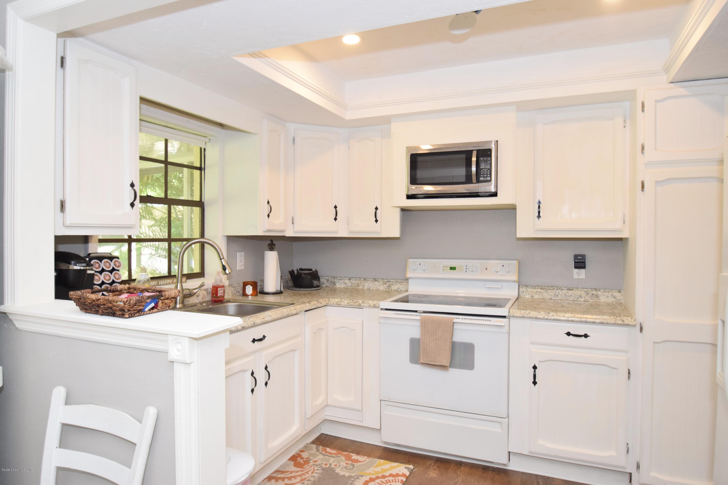 3940 Lake Washington Road Melbourne, FL 32934 - Photo 30 of 32 Kitchen in Cottage