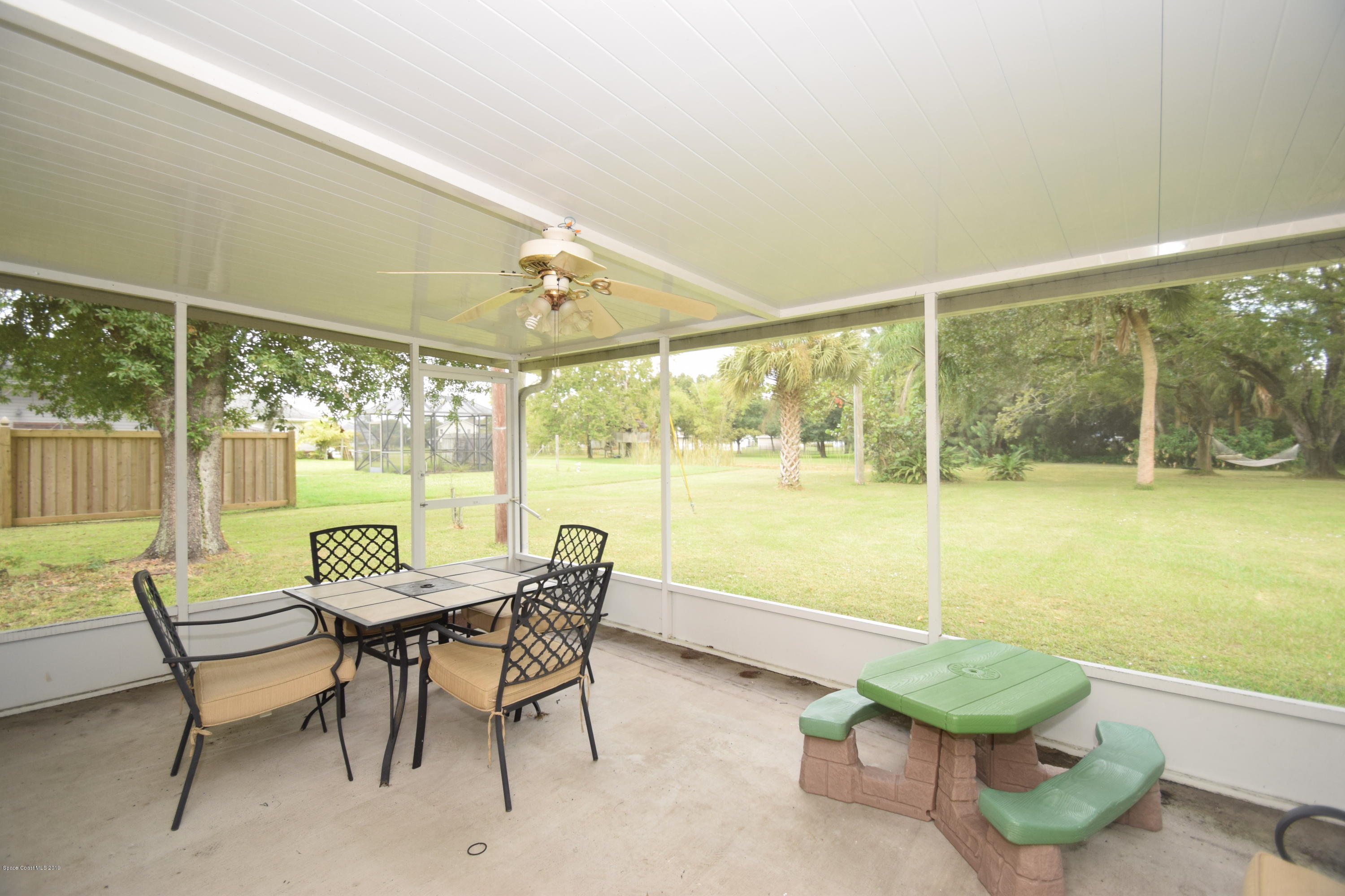 3940 Lake Washington Road Melbourne, FL 32934 - Photo 32 of 32 Cottage Screened Patio
