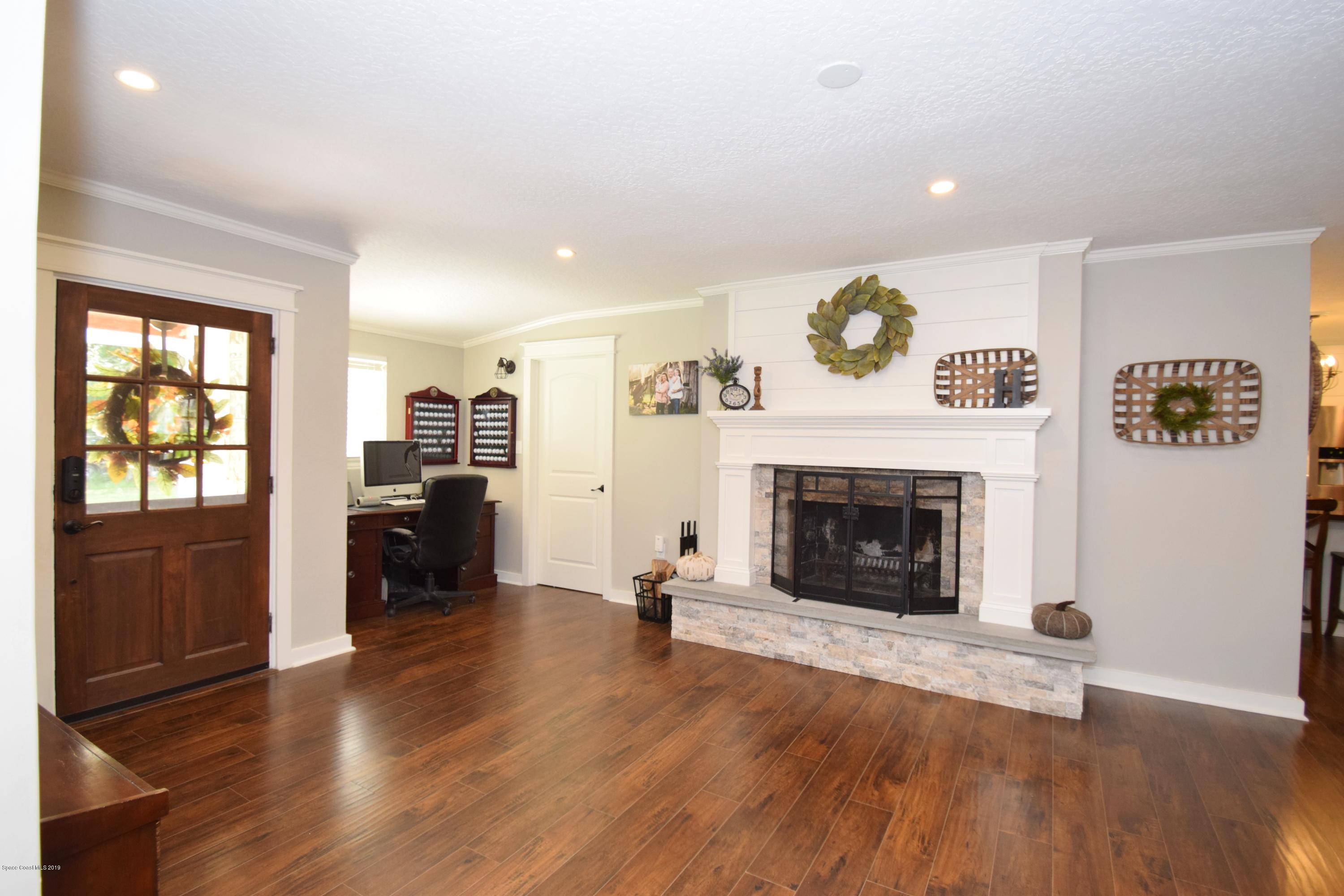 3940 Lake Washington Road Melbourne, FL 32934 - Photo 9 of 32 Fireplace Area