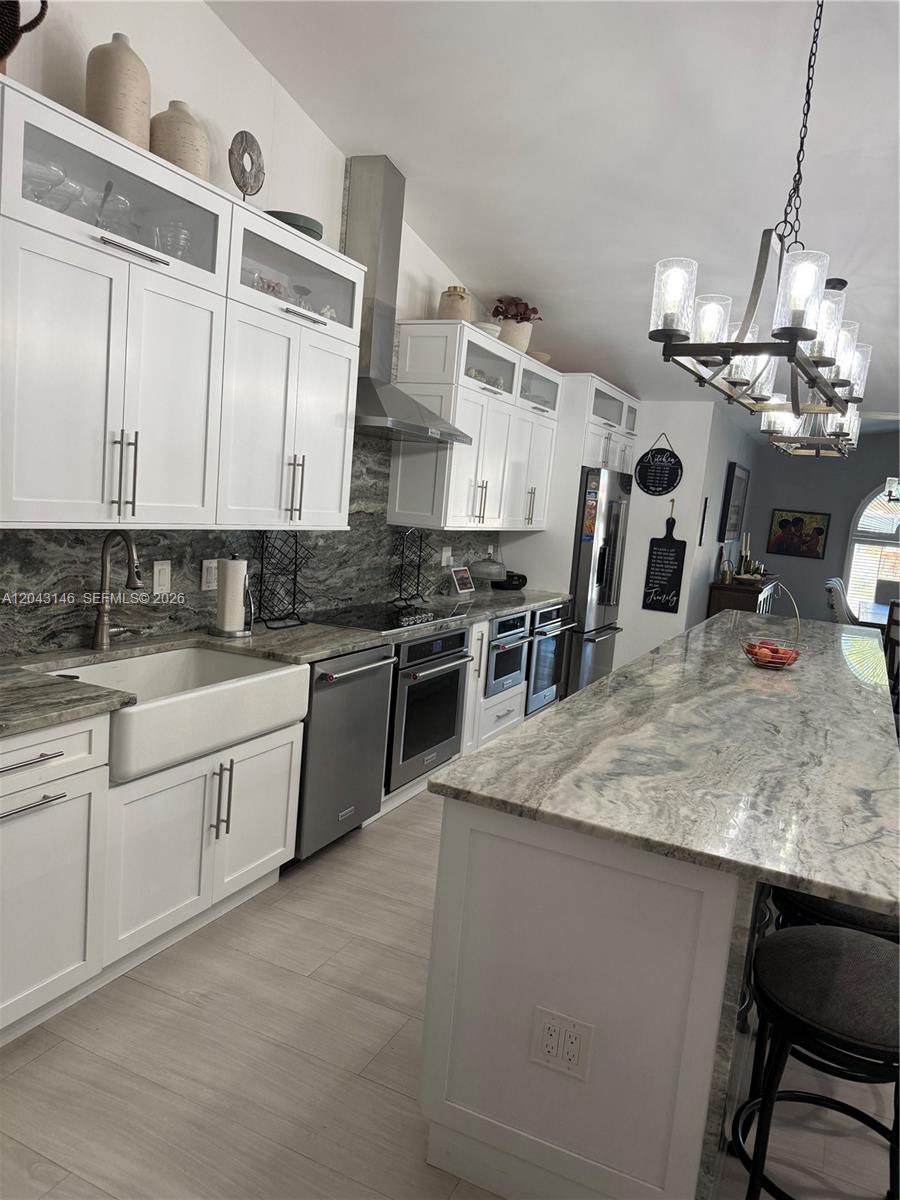 4947 Southwest 143rd Avenue Miami, FL 33175 - Photo 10 of 19 The kitchen from the left view.