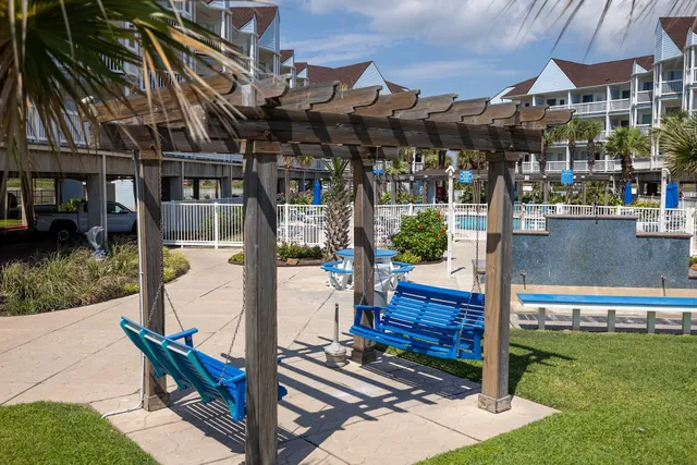 a view of a swimming pool with an ocean view