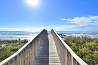 a water heater on a wooden floor