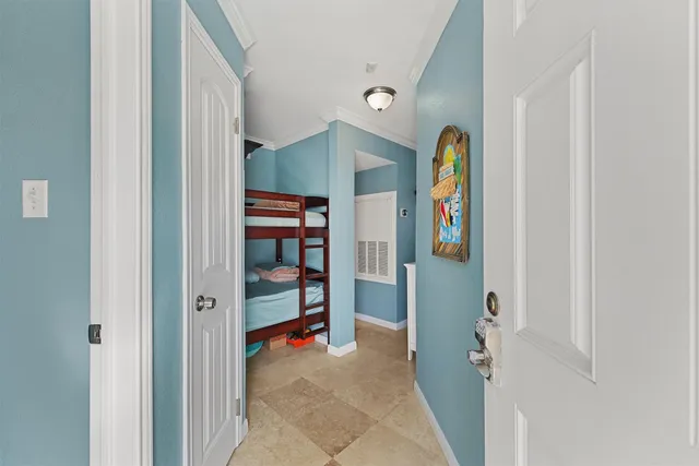 a kitchen with granite countertop stainless steel appliances and wooden cabinets