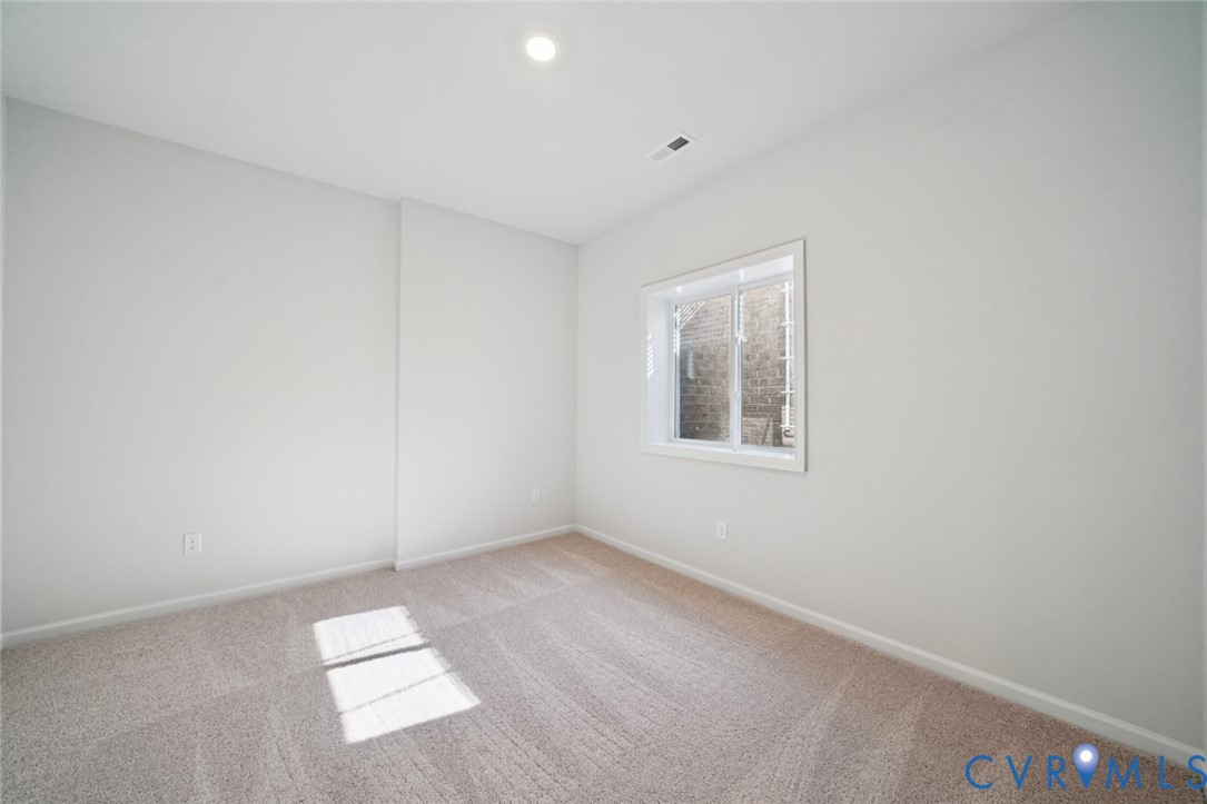 346 Mt Mccauley Way Aylett, VA 23009 - Photo 16 of 32 an empty room with a window